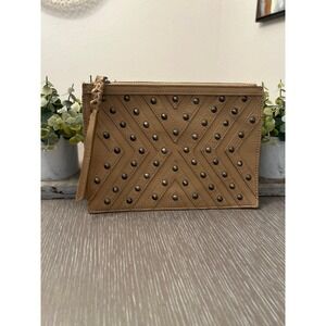 BCBGeneration The Starstruck Clutch in a camel studded faux leather material